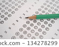 Answer sheets with pencil drawing fill to select choice, education. 134278299