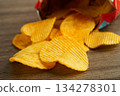 Potato chips , delicious BBQ seasoning spicy for crips, thin slice deep fried snack fast food. 134278301