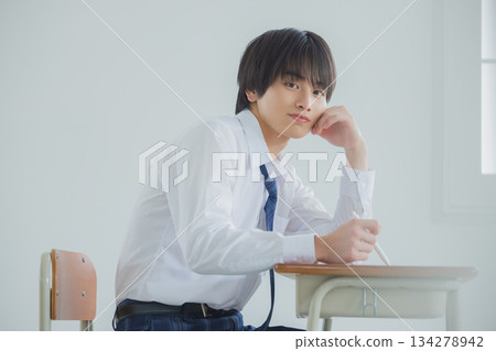 Male high school student studying 134278942