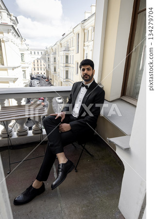 Beautiful man, groom posing and preparing for wedding 134279704