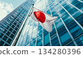 Japan wave flag in front of skyscraper. 134280396