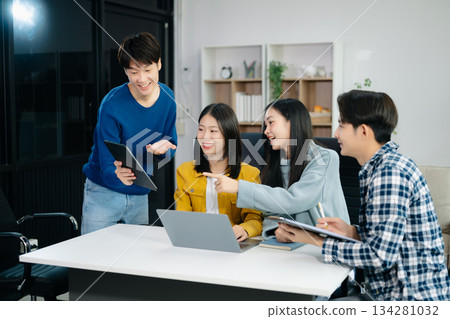 Group of Asian business meeting in planning design in creative business discussing work 134281032