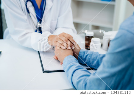 Asian female hands touching old female hand Helping hands take care of the elderly concept in hospital 134281113