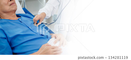 Asian doctor in white suit take notes while discussing and Asian elderly, man patient who lying on bed with receiving saline solution 134281119