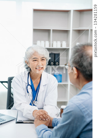 Asian female hands touching old female hand Helping hands take care of the elderly concept in hospital 134281159