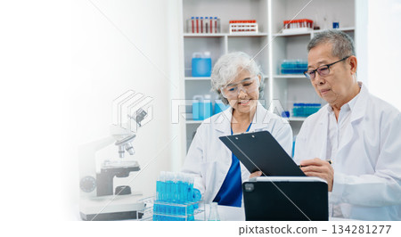 Scientist two woman with tablet and laptop, laboratory and ecofriendly science. Agriculture, research and scientists with online reading, test samples Scientist two woman with tablet and laptop, laboratory and ecofriendly science. Agriculture, research and scientists with online reading, test samples 134281277