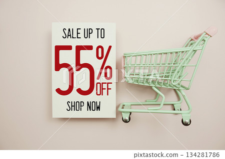 Sale 55% off text with alarm clock and trolley shopping cart on pink background Sale 55% off text with alarm clock and trolley shopping cart on pink background 134281786