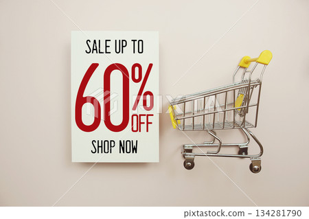 Sale 60% off text with trolley shopping cart on wooden background 134281790