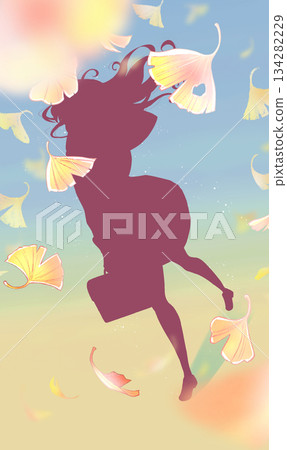 Walking female student, sailor uniform, silhouette, ginkgo tree, dusk 134282229