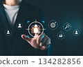 Businessman touching virtual target audience icon, digital marketing strategy concept showing customer segmentation, data analytics, and business targeting for online marketing success 134282856