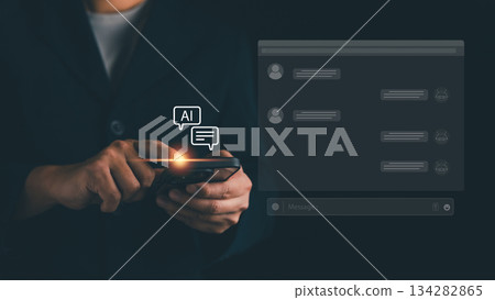 Businessman using smartphone with glowing AI chatbot interface, representing artificial intelligence, virtual assistant, online communication, customer support automation, Future digital technology Businessman using smartphone with glowing AI chatbot interface, representing artificial intelligence, virtual assistant, online communication, customer support automation, Future digital technology 134282865