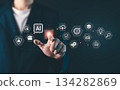 AI artificial intelligence tech, Businessman touching virtual AI technology icons interface, data analysis, cloud computing and digital transformation concept for innovation and business strategy 134282869