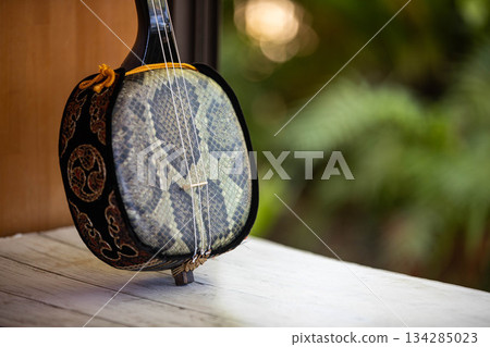 Image of Okinawan sanshin by the window 134285023