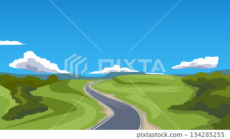 Landscape featuring winding roads stretching along the hillsides. Valleys are covered with forests. Background of forest and mountain under blue sky and white clouds. 134285255