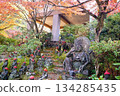 Autumn leaves and small Jizo statues 134285435