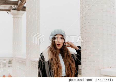 Surprised Woman Beret Leather Jacket Outdoors Fun 134286314