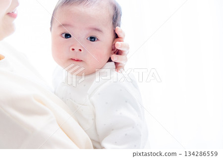 Cuddled baby 134286559