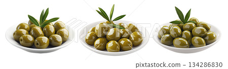 Green olives on a white plate with leaves, isolated on white transparent background, concept of healthy eating. Green olives on a white plate with leaves, isolated on white transparent background, concept of healthy eating. 134286830