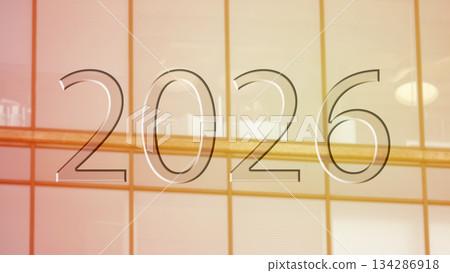2026 Future modern architecture. The concept of the new year. A modern glass building with the number 2026 on the background 134286918