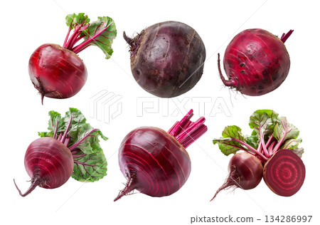 Set of Fresh red beetroot with its green leaves isolated against a white background Set of Fresh red beetroot with its green leaves isolated against a white background 134286997