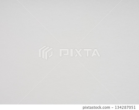 Soft white texture spreads across the paper, suggesting a quiet stillness and a gentle beginning 134287051