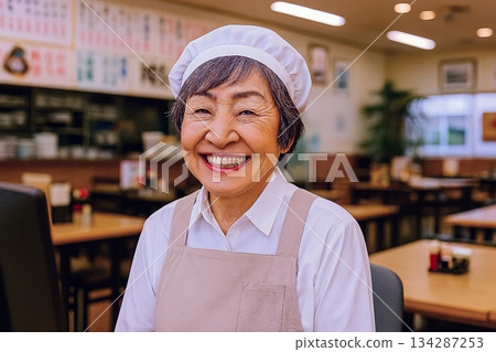 Senior woman working at a diner 134287253