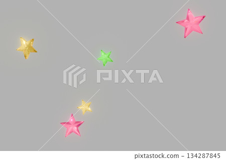 Red, yellow and green stars on a gray background Red, yellow and green stars on a gray background 134287845
