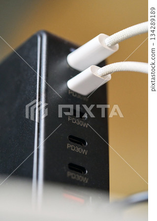 Multi-port charger in use 134289189