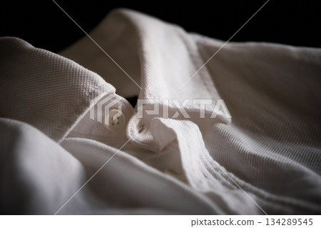 White Shirt Fabric Close-Up White Shirt Fabric Close-Up 134289545