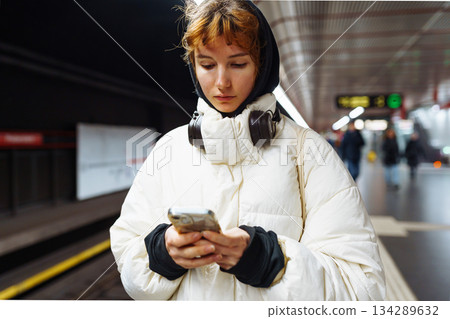 young woman in underground city transport young woman in underground city transport 134289632