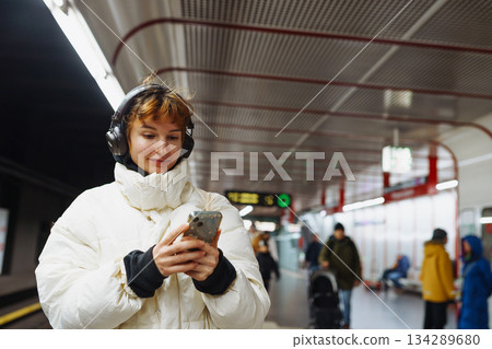 young woman in underground city transport 134289680