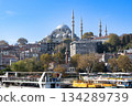 Mosque and ferry terminal in Istanbul, Turkey 134289739