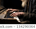 aged hands with wrinkles play piano 134290364