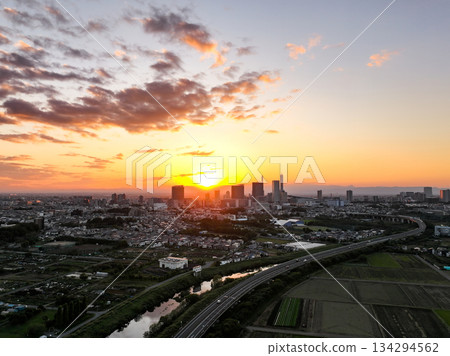 Aerial view of the sunset from the Minuma rice fields in Saitama Prefecture and Saitama New Urban Center Aerial view of the sunset from the Minuma rice fields in Saitama Prefecture and Saitama New Urban Center 134294562