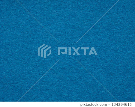 Blue matte felt fiber texture. Natural wool for text, lettering, patchworkor 3d art work. Full frame backdrop wallpaper. Matt retro velvet pattern or vintage background in high resolution. 134294615