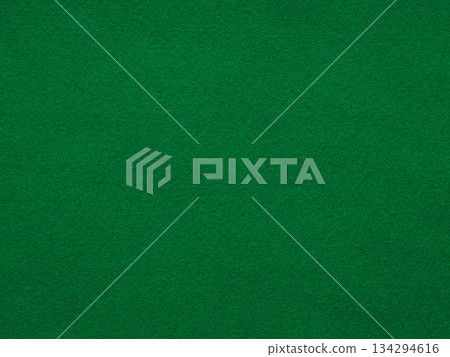 Enveloping forest green felt, rich in texture, creates a haven of stillness, inviting introspection and creative musings 134294616