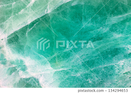 Green Fluorite. Gemstone background. Matt natural semi precious mineral pattern. Semiprecious stone texture, ceramic wall, floor digital tiles. Material for unique interior, exterior design decoration Green Fluorite. Gemstone background. Matt natural semi precious mineral pattern. Semiprecious stone texture, ceramic wall, floor digital tiles. Material for unique interior, exterior design decoration 134294653