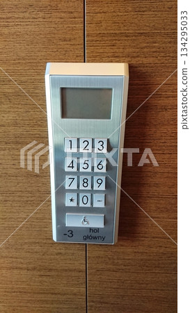 Electronic access control keypad mounted on wall Electronic access control keypad mounted on wall 134295033