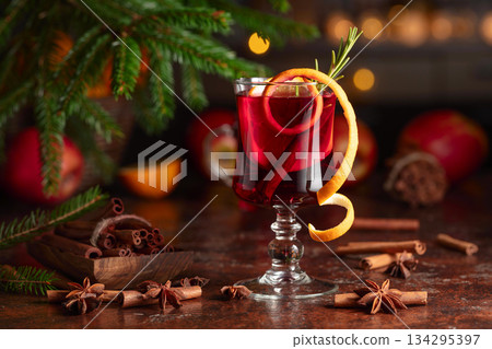 Christmas mulled wine with citrus, cinnamon, anise, and rosemary. 134295397