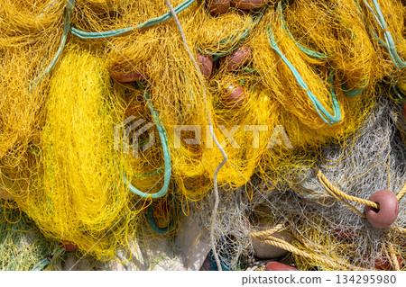 Pile of yellow fishing nets, Corfu (Korfu), Greece Pile of yellow fishing nets, Corfu (Korfu), Greece 134295980