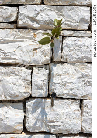 Stone wall and keys on a cord, Kerkyra, Corfu, Greece Stone wall and keys on a cord, Kerkyra, Corfu, Greece 134296008