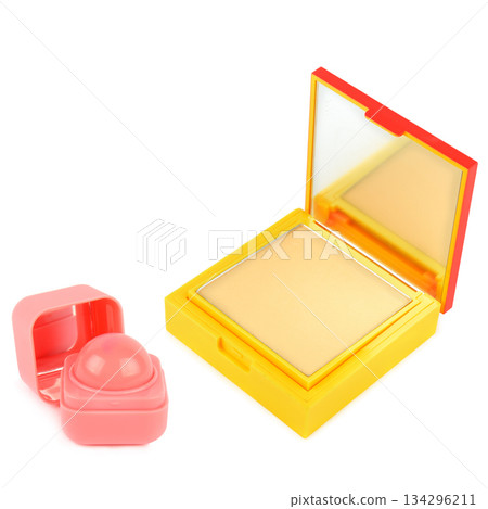 Bright Yellow Compact Powder and Pink Lip Balm on White Background 134296211
