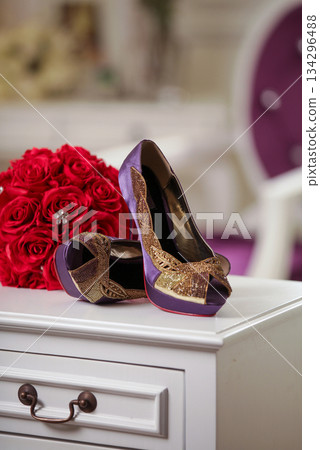 Elegant high heels woman shoes rest on an aesthetic background, good for creating a striking fashion still life perfect for beauty, footwear, or fashion retail campaigns 134296488