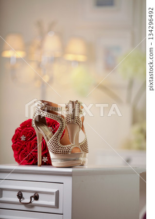 Elegant high heels woman shoes rest on an aesthetic background, good for creating a striking fashion still life perfect for beauty, footwear, or fashion retail campaigns 134296492