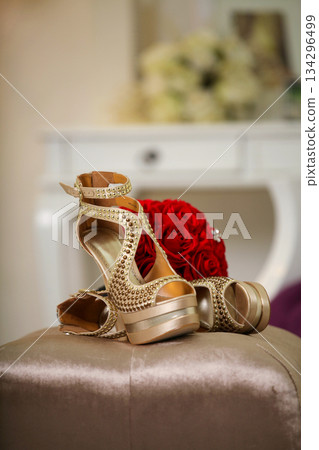 Elegant high heels woman shoes rest on an aesthetic background, good for creating a striking fashion still life perfect for beauty, footwear, or fashion retail campaigns Elegant high heels woman shoes rest on an aesthetic background, good for creating a striking fashion still life perfect for beauty, footwear, or fashion retail campaigns 134296499