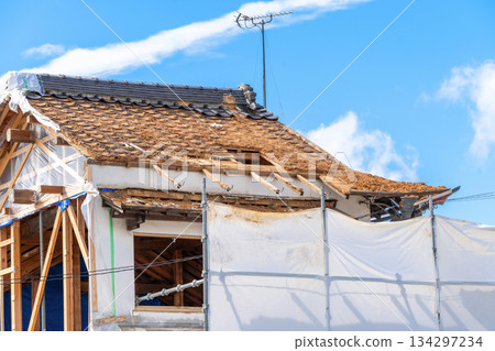 Demolition site of an old wooden house Demolition site of an old wooden house 134297234