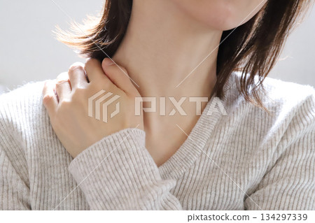 Woman with stiff shoulders, tired 134297339