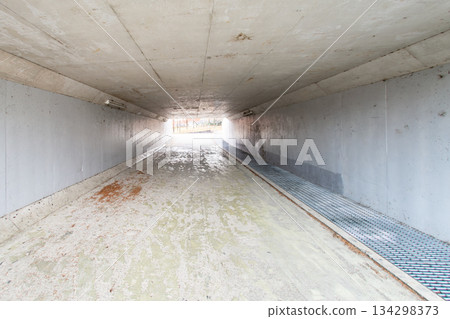 A tunnel that passes under the road A tunnel that passes under the road 134298373