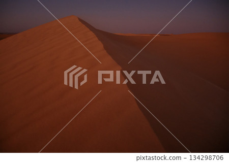 Red Sand Dune at Sunset Red Sand Dune at Sunset 134298706