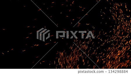 Realistic fire sparks flying through the air, isolated on a black background. Perfect as a cinematic VFX overlay, fire particles effect or visual element. Realistic fire sparks flying through the air, isolated on a black background. Perfect as a cinematic VFX overlay, fire particles effect or visual element. 134298884